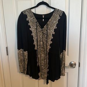Free people NWT wild print tunic F120T493 size S. Never been worn. Only tried on
